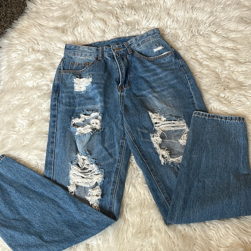 Blue ripped jeans size XS.